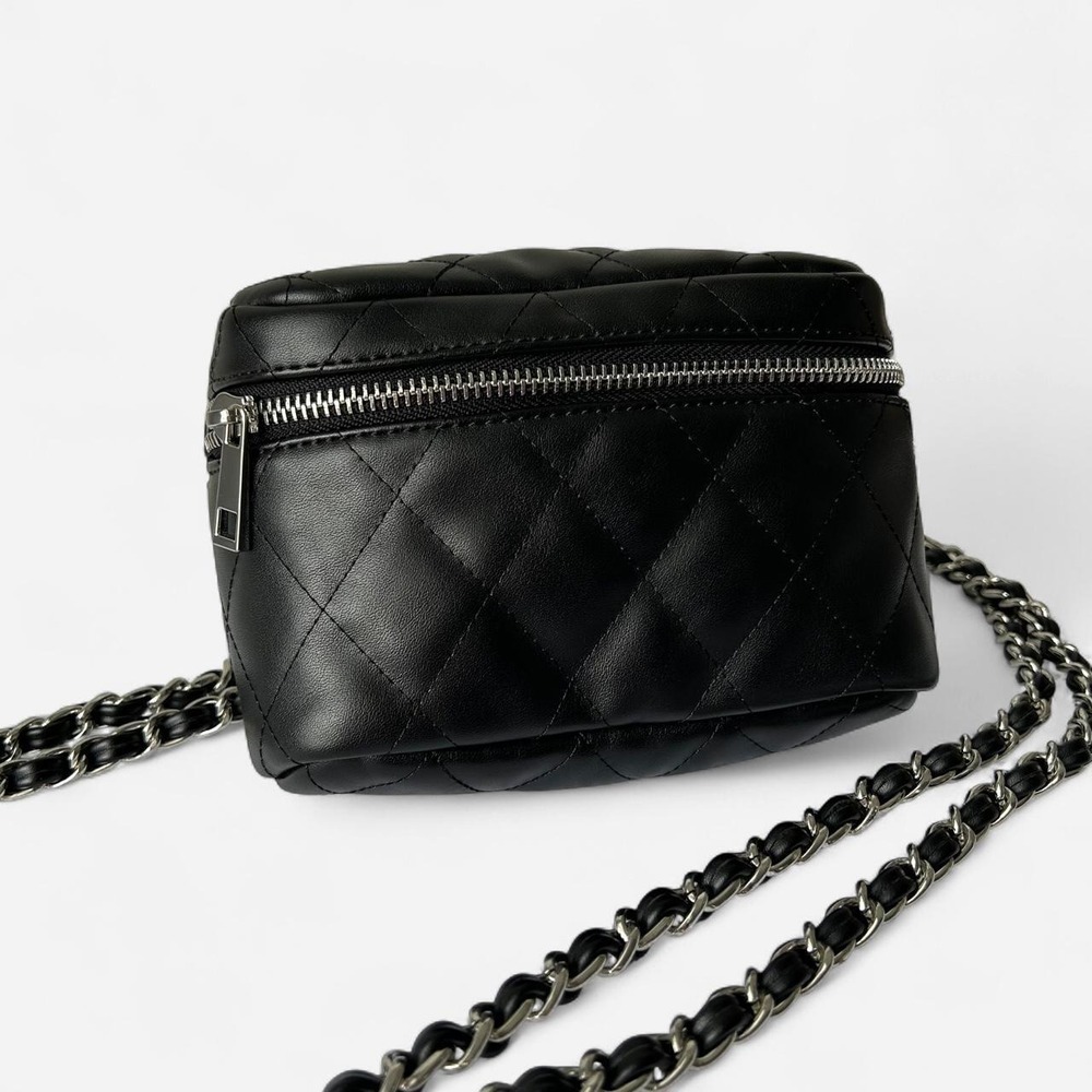 Forever 21 Black Quilted crossbody bag with silver chain strap.